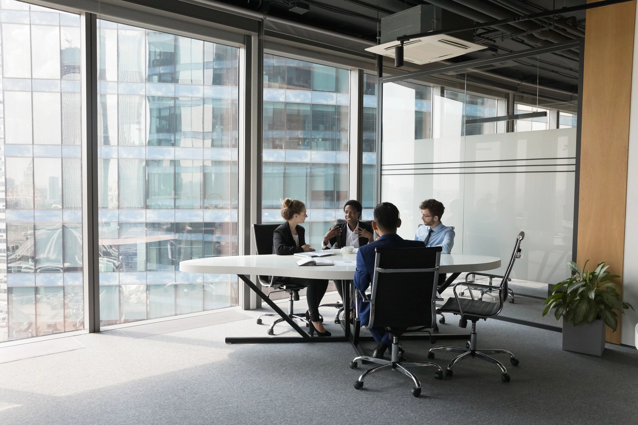 Legal team collaborating in a modern office