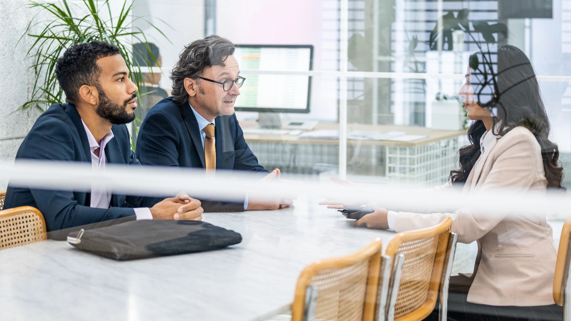 Professional office discussion about legal documents